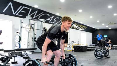 Matt Ritchie lifts weights during the Newcastle training session. Getty