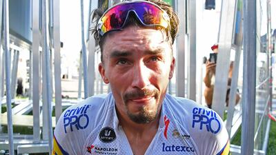 An emotional Julian Alaphilippe dedicated his victory on Stage 2 to his late father. AFP