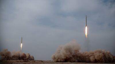 Missiles launch during the second day of military drill in an unknown location, central Iran. EPA