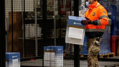 The vaccines for Covid-19 arrive at the military airport of Pratica di Mare in Rome, Italy. LaPresse via AP