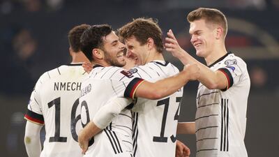 Germany forward Thomas Muller celebrates with teammates after scoring against Liechtenstein. AFP