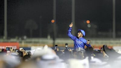 Christophe Soumillon after winning the Dubai World Cup on Thunder Snow. Chris Whiteoak / The National