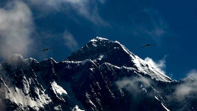 Nepal issued a record 381 Everest permits this season and a short weather window resulted in some teams waiting several hours in the dangerous "dead zone", running out of oxygen supplies and risking exhaustion. AP Photo