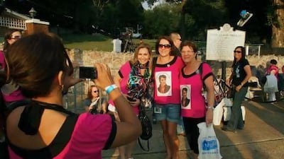 Fans of Elvis Presley gather outside Graceland, which remains a popular tourist destination more than 35 years after his death. Robert Macpherson / AFP