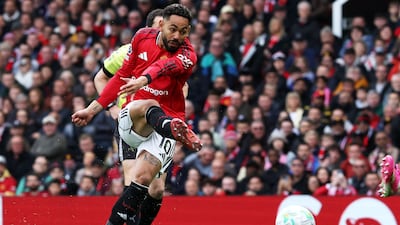 Matheus Cunha scores the first goal against Liverpool at Old Trafford. AFP