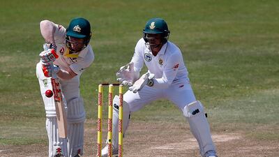 David Warner, left, and Quinton de Kock, right, may eventually clear the air. Marco Longari / AFP