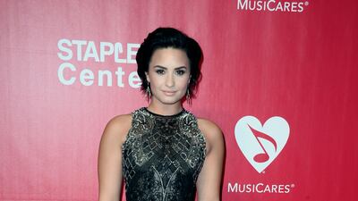 Demi Lovato, in Lorena Sarbu, attends the MusiCares Person of the Year benefit gala dinner and concert in Los Angeles, California, on February 13, 2016. EPA