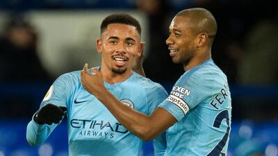 Gabriel Jesus, left, scored Manchester City's second goal against Everton deep into injury time on Wednesday. EPA