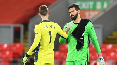 Goalkeeper: Alisson (Liverpool) – Two terrific saves denied Bruno Fernandes and Paul Pogba to secure a stalemate and extend Liverpool’s long unbeaten home record. AFP