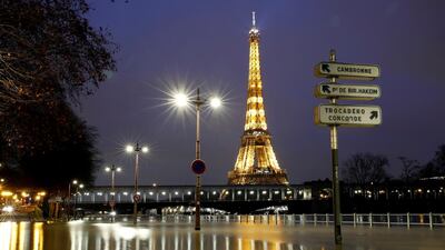 The Eiffel Tower looks down on the flooded banks of the River Seine after days of heavy rain in Paris, the French capital. Reuters