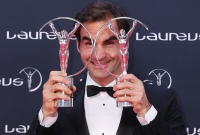Roger Federer holds his awards for Laureus World Comeback of the Year 2018 and Laureus World Sportsman of the Year 2018 during the Laureus World Sports Awards 2018 at Salle des Etoiles, Monte Carlo. Boris Streubel/Getty Images for Laureus