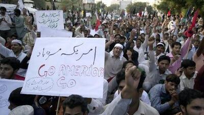 Pakistani protesters demonstrate outside the US consulate in Lahore after the US accused the country's most powerful intelligence agency of supporting extremist attacks against American targets in Afghanistan. K.M. Chaudary / AP Photo