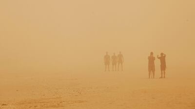 People in Umm Suqeim Beach, Dubai. Mona Al Marzooqi / The National