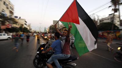 As night fell, there was no letup in the celebrations as the rhythmic thud of drums beat a celebratory pulse. Mohammed Abed/ AFP Photo