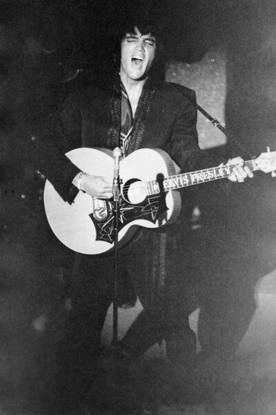 Elvis Presley performs at the Las Vegas International Hotel in August 1969 as part of a comeback residency. Getty Images