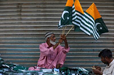 A man sells Kashmir's flags in Karachi ahead of Pakistan's Independence Day. Reuters