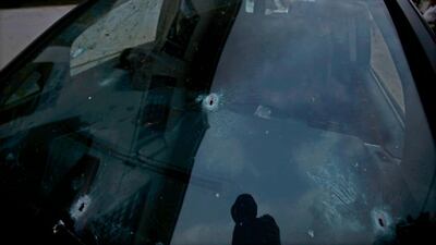 A view of bullet holes in the windshield of the vehicle in which Shujaat Bukhari, senior journalist and Editor-in-Chief of English daily 'Rising Kashmir,' was killed in a militant attack at Press Colony in Srinagar, the summer capital of Indian Kashmir. Farooq Khan/ EPA