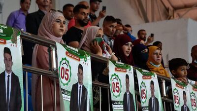 Supporters of the Democratic National Rally at a campaign event. AFP