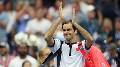 Roger Federer applauds the crowd at Arthur Ashes Stadium after defeating Damir Dzumhur 3-6, 6-2, 6-3, 6-4. EPA