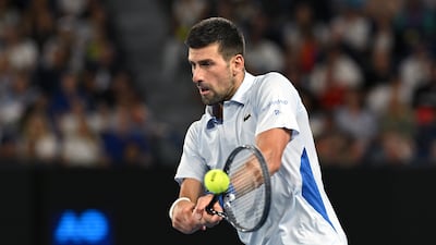 Novak Djokovic hits a return during his fourth-round match against Adrian Mannarino. EPA