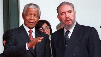 Cuban president Fidel Castro, right, and South African president Nelson Mandela during the Non-Aligned Movement summit in Durban in September 1998. Anna Ziemenski / AFP
