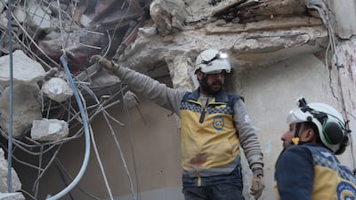 Medics inspect the damaged Ibn Sina Hospital following a Russian air strike, in Idlib, northern Syria. EPA