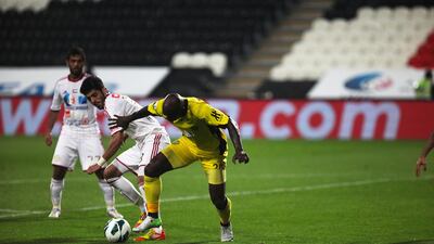 Achille Emana battles for a way past the Al Jazira defence. Lee Hoagland/The National