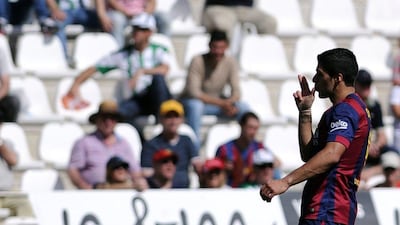 Barcelona's Luis Suarez celebrates one of his three goals on Saturday against Cordoba. Cristina Quicler / AFP / May 2, 2015