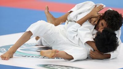 Mohammed Alhajri and Abdul Haldara compete in the Al Ain Jiu-Jitsu Junior Open. Delores Johnson / The National / September 20, 2015