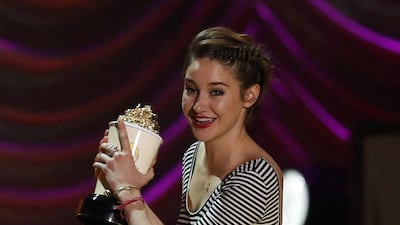 Actress Shailene Woodley accepts the award for Best Kiss for The Fault in Our Stars at the 2015 MTV Movie Awards. Mario Anzuoni / Reuters