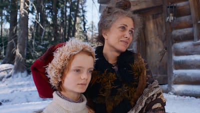 Henry Lawfull as Nikolas and Kristen Wiig as Aunt Carlotta in 'A Boy Called Christmas'. Photo: Netflix