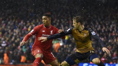 Liverpool's English midfielder Jordon Ibe (L) vies with Arsenal's Spanish defender Nacho Monreal during the English Premier League football match between Liverpool and Arsenal at Anfield stadium in Liverpool, north-west England on January 13, 2016. AFP PHOTO / PAUL ELLIS