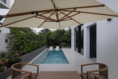 The pool area in Guy Norman's re-designed garden. Antonie Robertson / The National