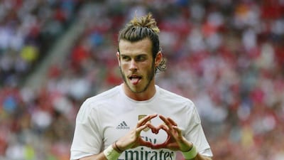 Gareth Bale celebrates after scoring the second goal for Real Madrid against Tottenham. Jason Cairnduff / Reuters
