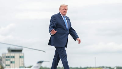 MORRISTOWN, NEW JERSEY - AUGUST 02: President Donald Trump prepares to board Air Force One at Morristown Municipal Airport on August 02, 2026 in Morristown, New Jersey. Trump spent the weekend at the Trump National Golf Club Bedminster. Anna Moneymaker/Getty Images/AFP (Photo by Anna Moneymaker / GETTY IMAGES NORTH AMERICA / Getty Images via AFP)