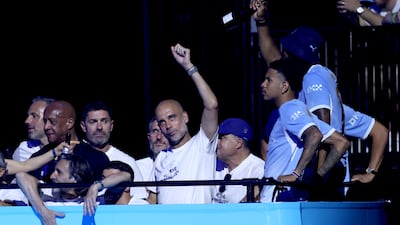 Manchester City manager Pep Guardiola acknowledges the fans as the bus arrives during the After Party Celebration to mark the achievements of Manchester City men’s, women’s and academy teams during the 2025/26 season at The Co-op Live Arena in Manchester, England. Getty Images