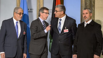 The UN special envoy for Libya Bernardino Leon, second from left, with representatives of the country’s warring factions on the first day of peace talks in Geneva on January 14, 2015. Fabrice Coffrini / AFP