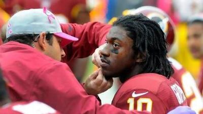 No one can fault Robert Griffin III's competitive nature, but the next time he decides to tuck the ball and run he should think about sliding rather than taking the hit.