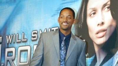 Will Smith, in a shiny grey suit, attends the premiere of 'I, Robot' on September 8, 2004 in Tokyo, Japan. Getty Images