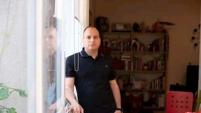 Adeeb Awad, pictured in his Tel Aviv house, has accused Israeli airport security of conducting a degrading security check.