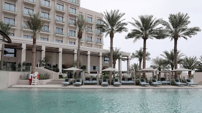 A palm tree-lined pool