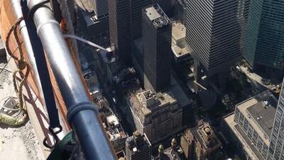 Workers’ view from a suspended scaffold in midtown Manhattan. John S Moller