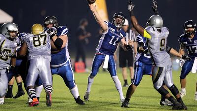 Barracudas QB David Pearce launches a pass during the Desert Bowl. Chris Whiteoak / The National