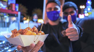 For a sweet and hearty snack try the luqaimat with honey from Haris & Marquqa, one of the many food stalls at the Sheikh Zayed Heritage Festival.