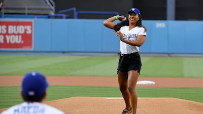 Osaka makes her pitch at Dodger Stadium. AP
