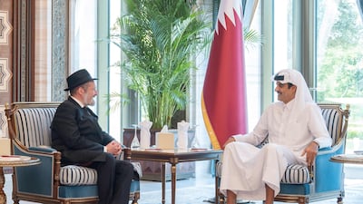 Qatar's Emir Sheikh Tamim receives Rabbi Mendi Chitrik at Lusail Palace. AFP