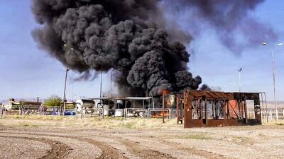 A fire rages at an unspecified hydrocarbon facility reportedly following a Turkish air strike in the vicinity of Tal Awdah in north-eastern Syria's Hassakeh province. AFP