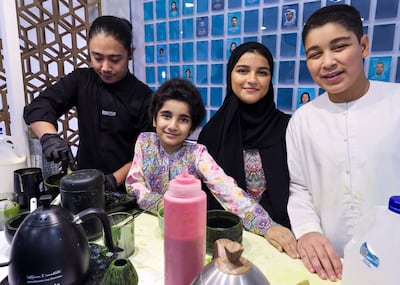 Mahra, 9, opens her dream matcha stand at Yas Clinic. Victor Besa / The National