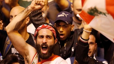 Demonstrators shout during a protest in Tripoli. REUTERS