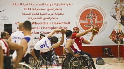 The UAE's men's wheelchair basketball team in action against Jordan at Al Ahli Sports Club in Dubai. Lee Hoagland / The National